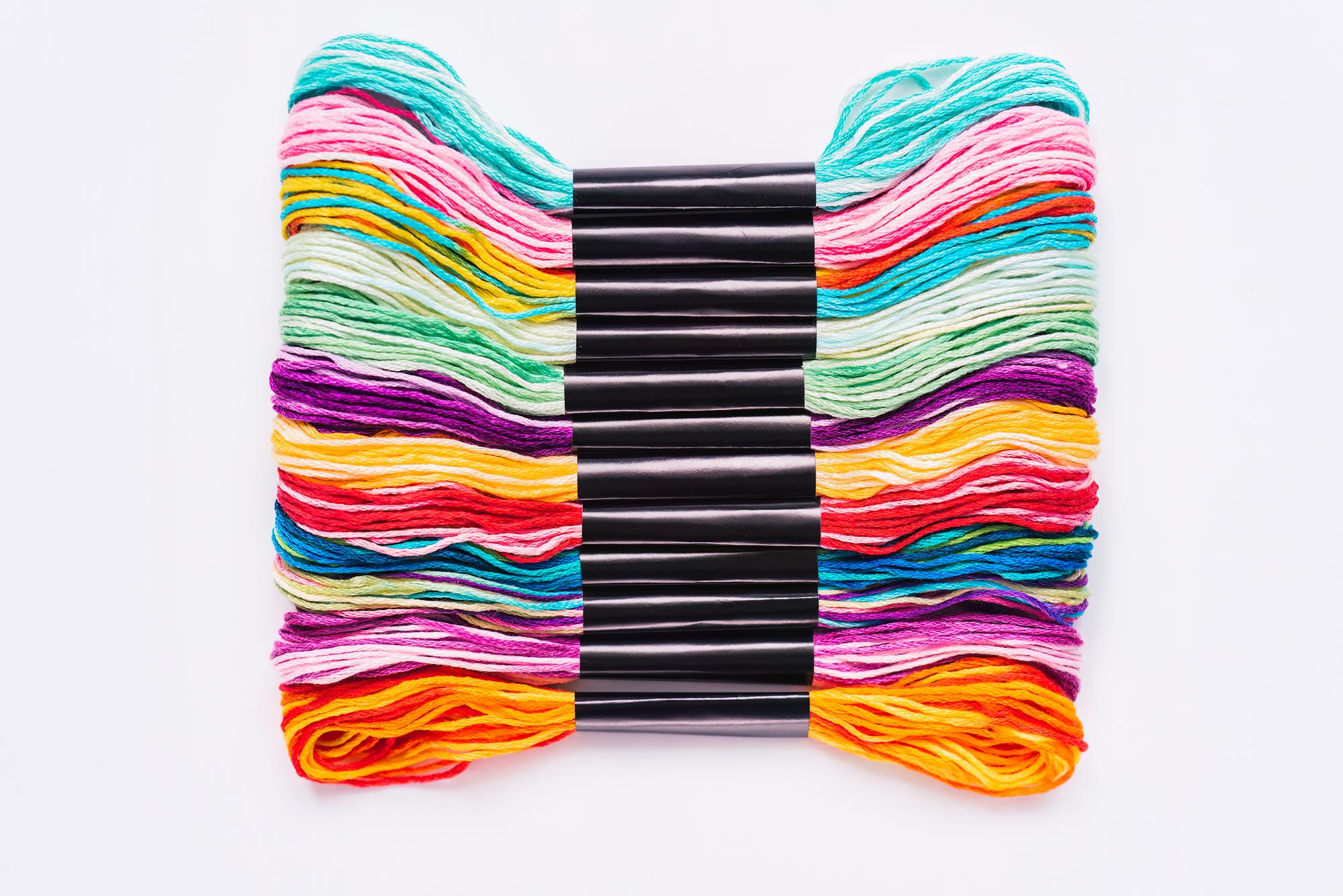 Stack of embroidered patches with bold colours