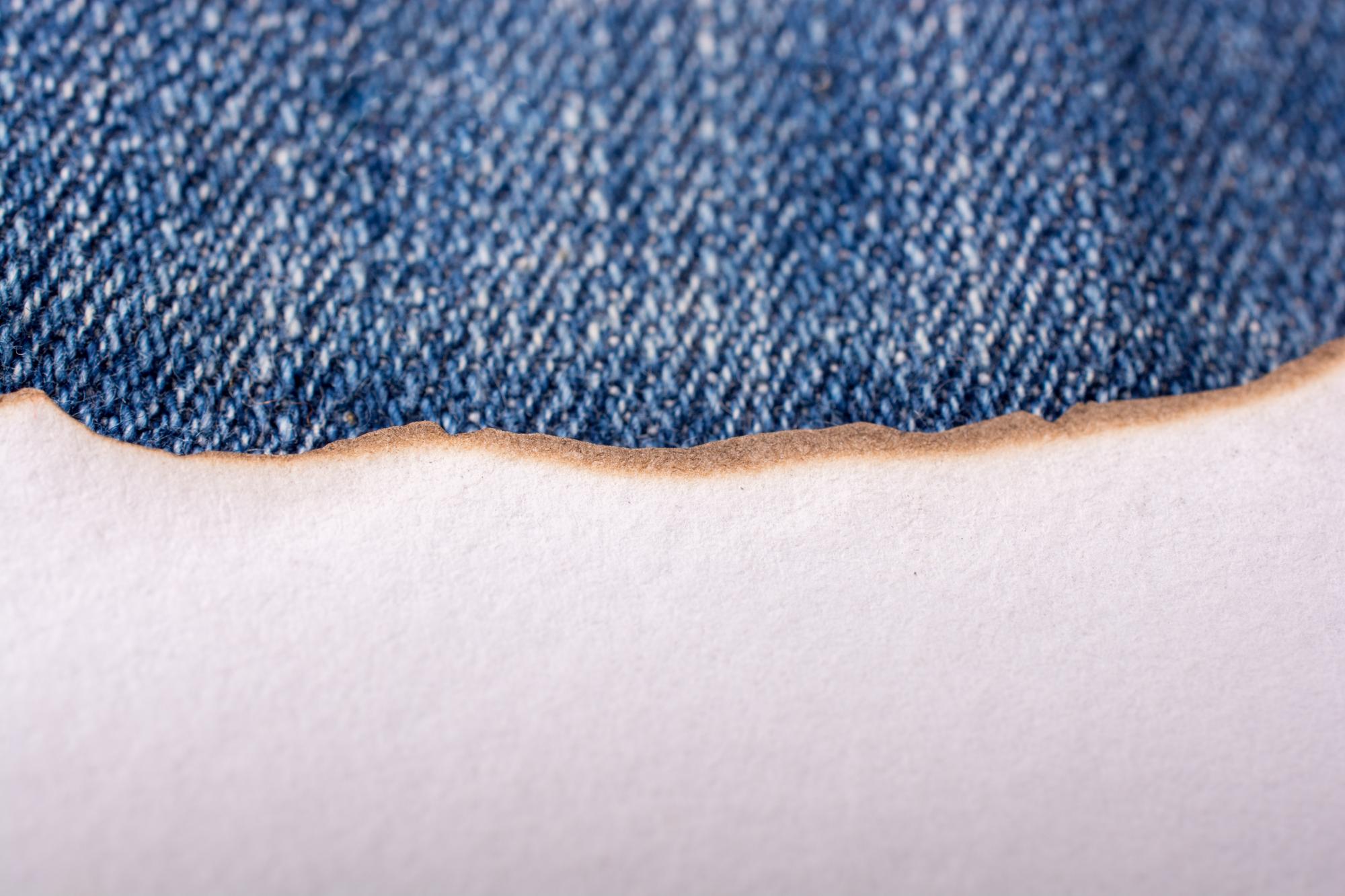 Close-up of bold embroidered patch on denim